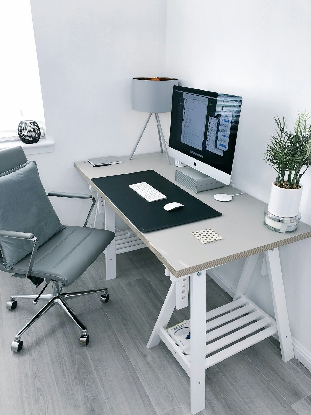 Office workspace with planning materials and furniture